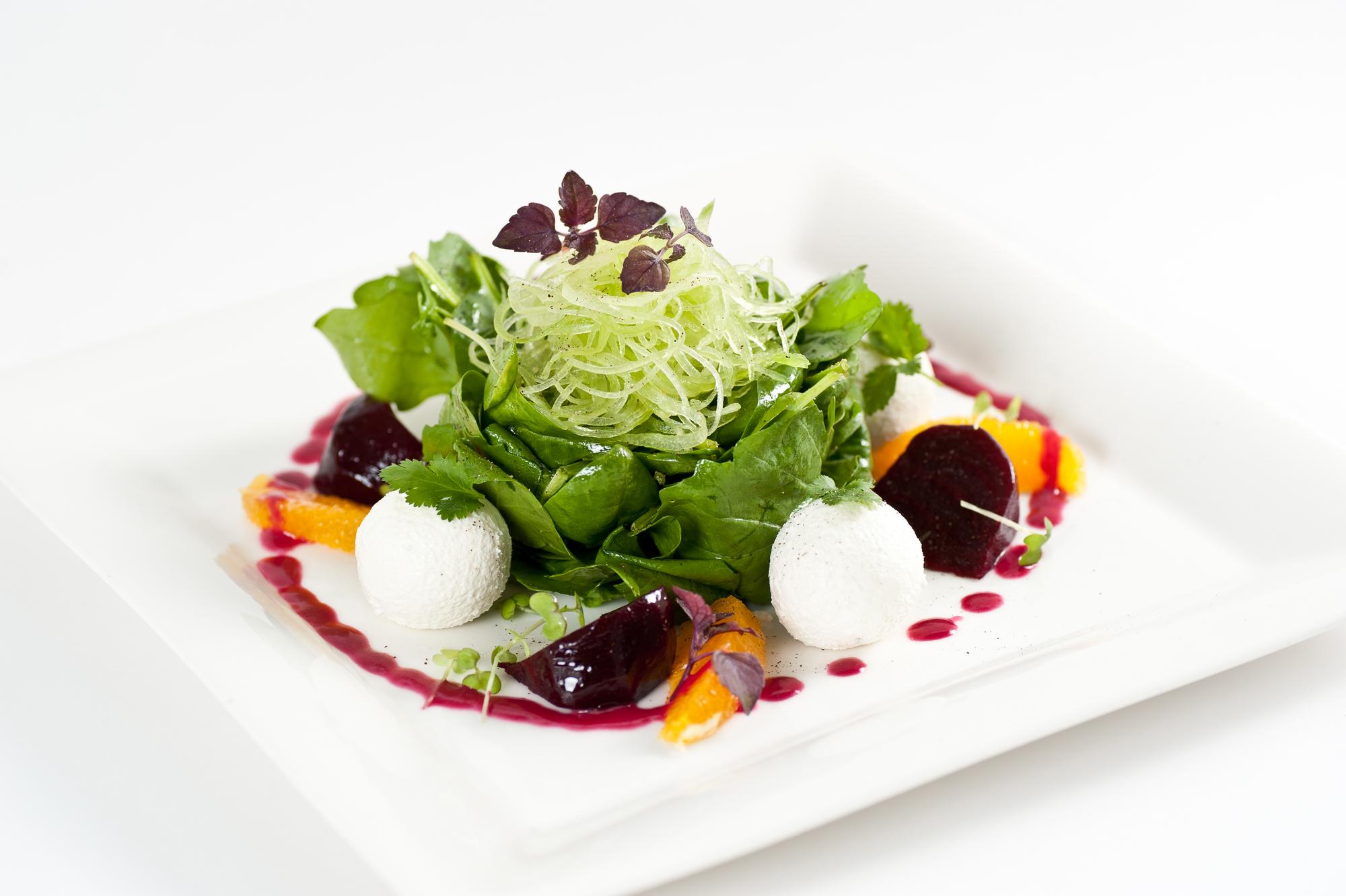 Plated seasonal salad with garnish